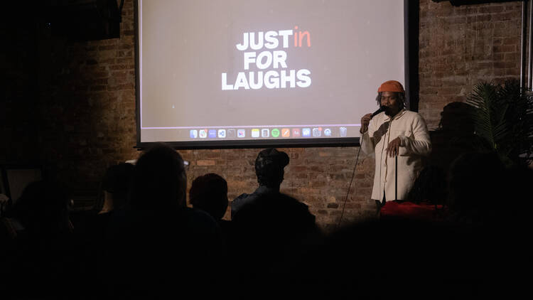 Justin Catchens, a comedian, on stage.