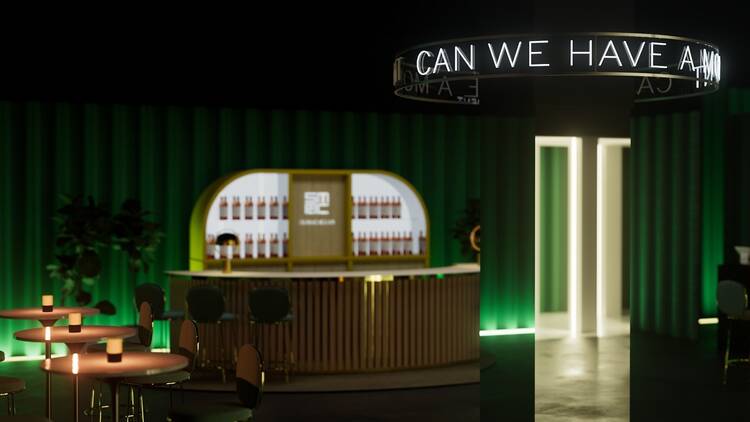 A Macallan pop-up with green decor and a bar.