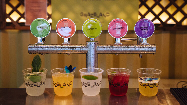 Assorted Casa tap cocktails in different colours and flavours at a Grazeland bar.