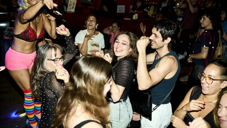 People dancing at an event.