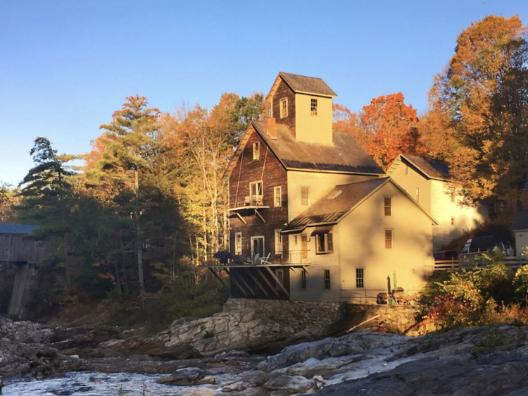The four-storey mill overlooking a waterfall in Vermont