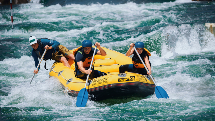 People white water rafting