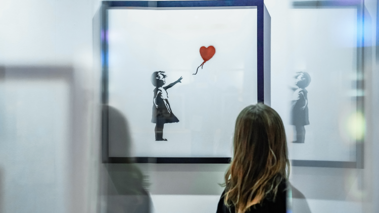 Banksy heart girl painting