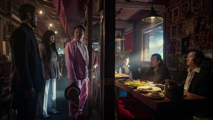 The Brothers Sun. (L to R) Justin Chien as Charles Sun, Jenny Yang as Xing, Joon Lee as TK, Jon Xue Zhang as Blood Boots, Jay Kwon as Kevin Lee in episode 104 of The Brothers Sun. Cr. Michael Desmond/Netflix © 2023