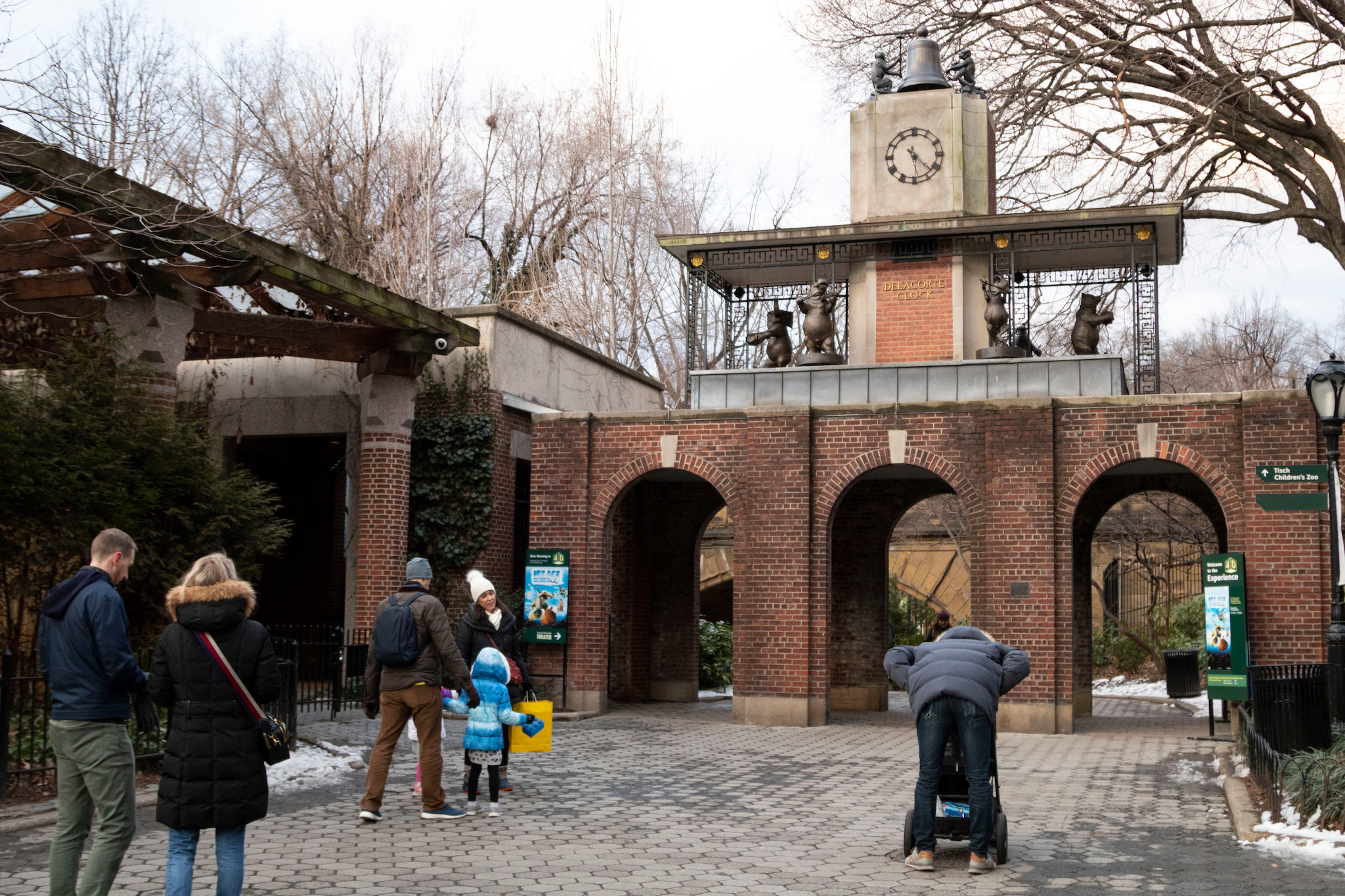 People near the Delacorte Clock in Central Park