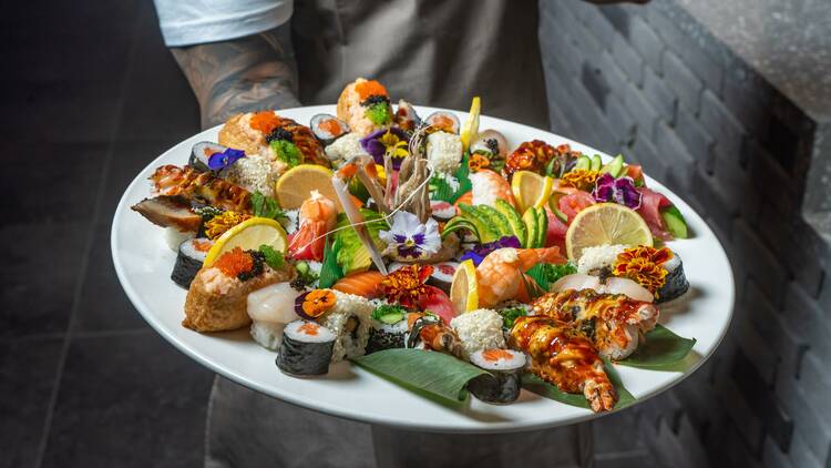 A big platter of sushi