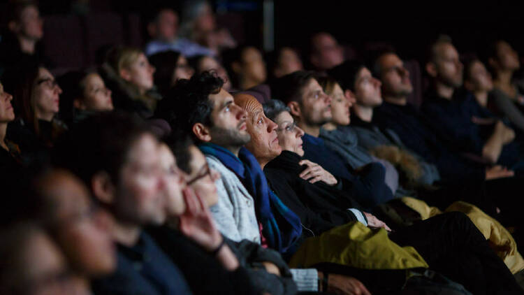 Audience watching a film