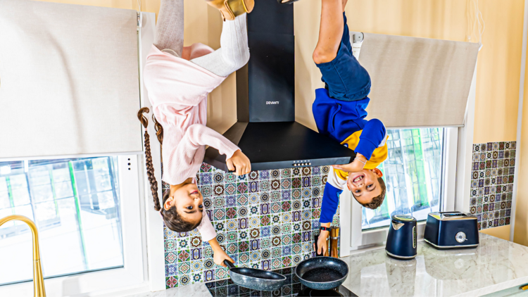 people inside inverted house 