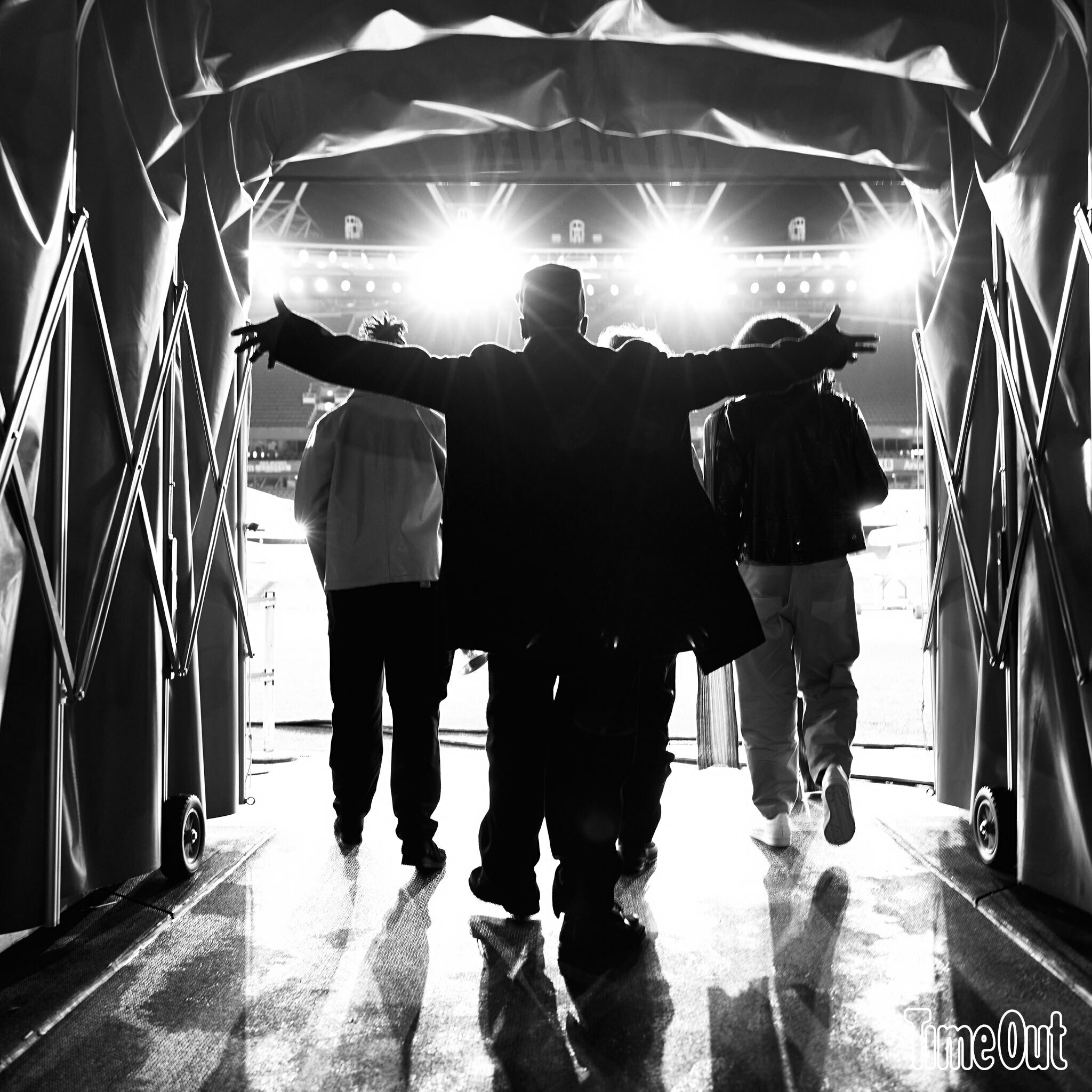 Men walking onto the pitch 