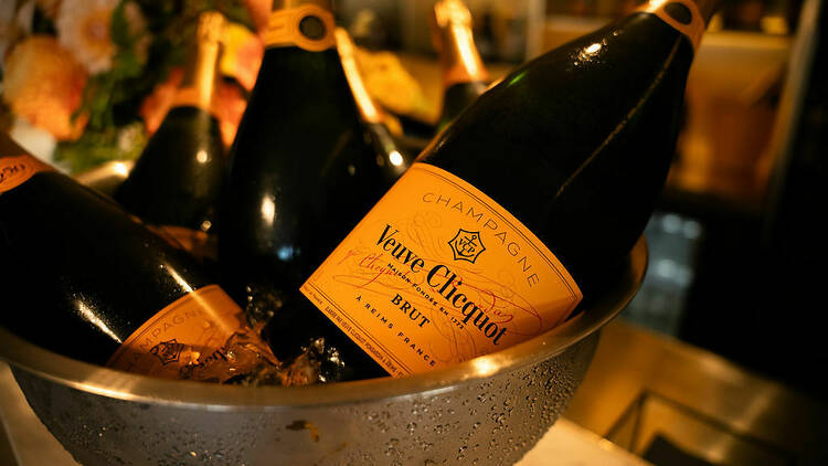 bottles of Veuve Clicquot Champagne on ice