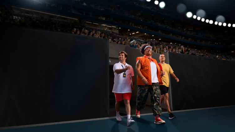 Three people walking onto a dark tennis court