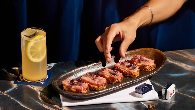 Prawn toast and a cocktail