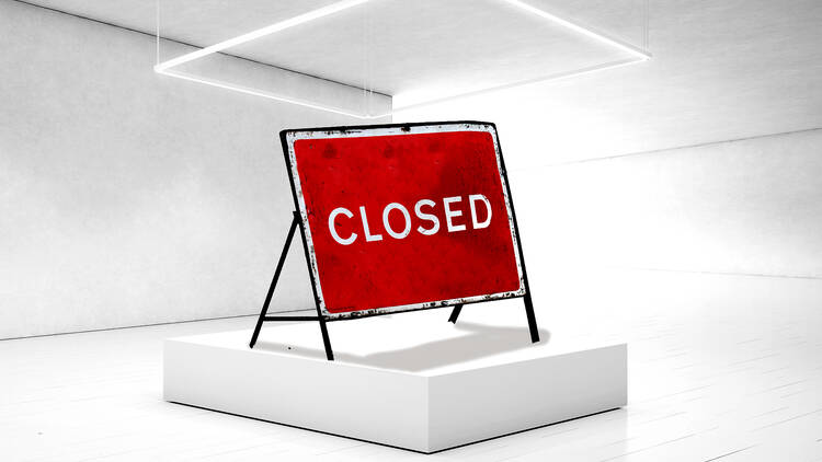 A closed sign in a gallery 