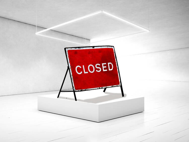 A closed sign in a gallery 