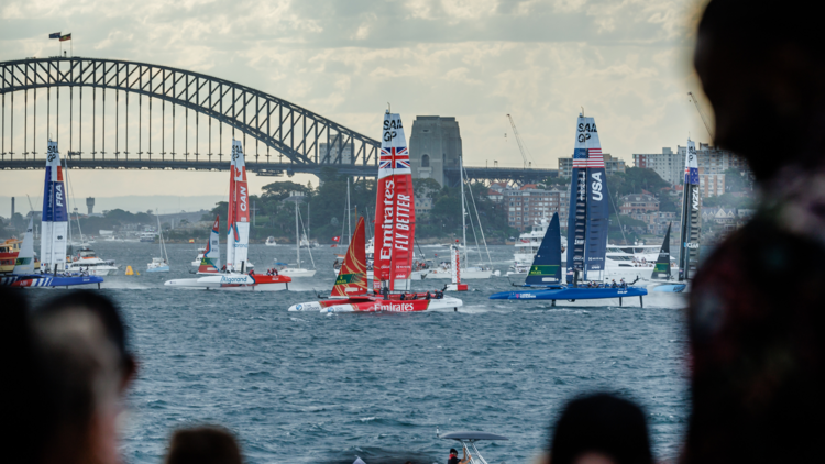 Boats competing in a sail race on Sydney Harbour