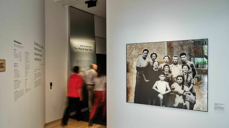 People walk through an exhibition at the Melbourne Holocaust Museum.