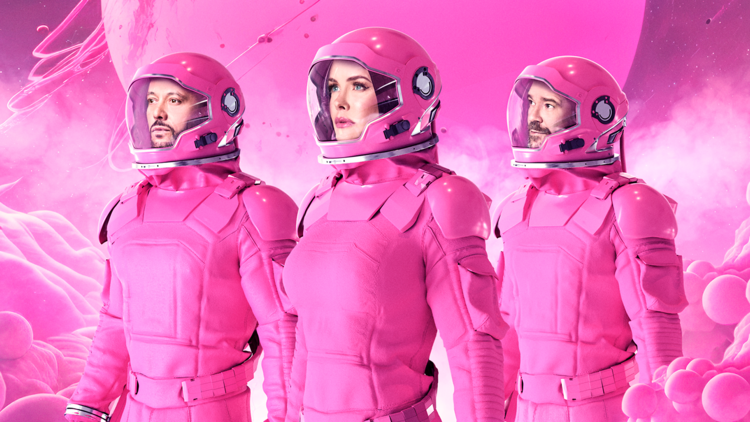 Aqua band posing in pink space suits
