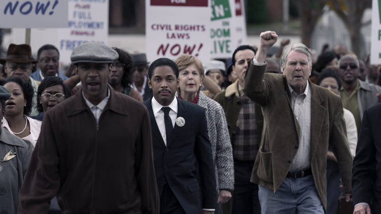  Martin Luther King Jr., played by Kelvin Harrison Jr., marches in protest in GENIUS: MLK/X. 