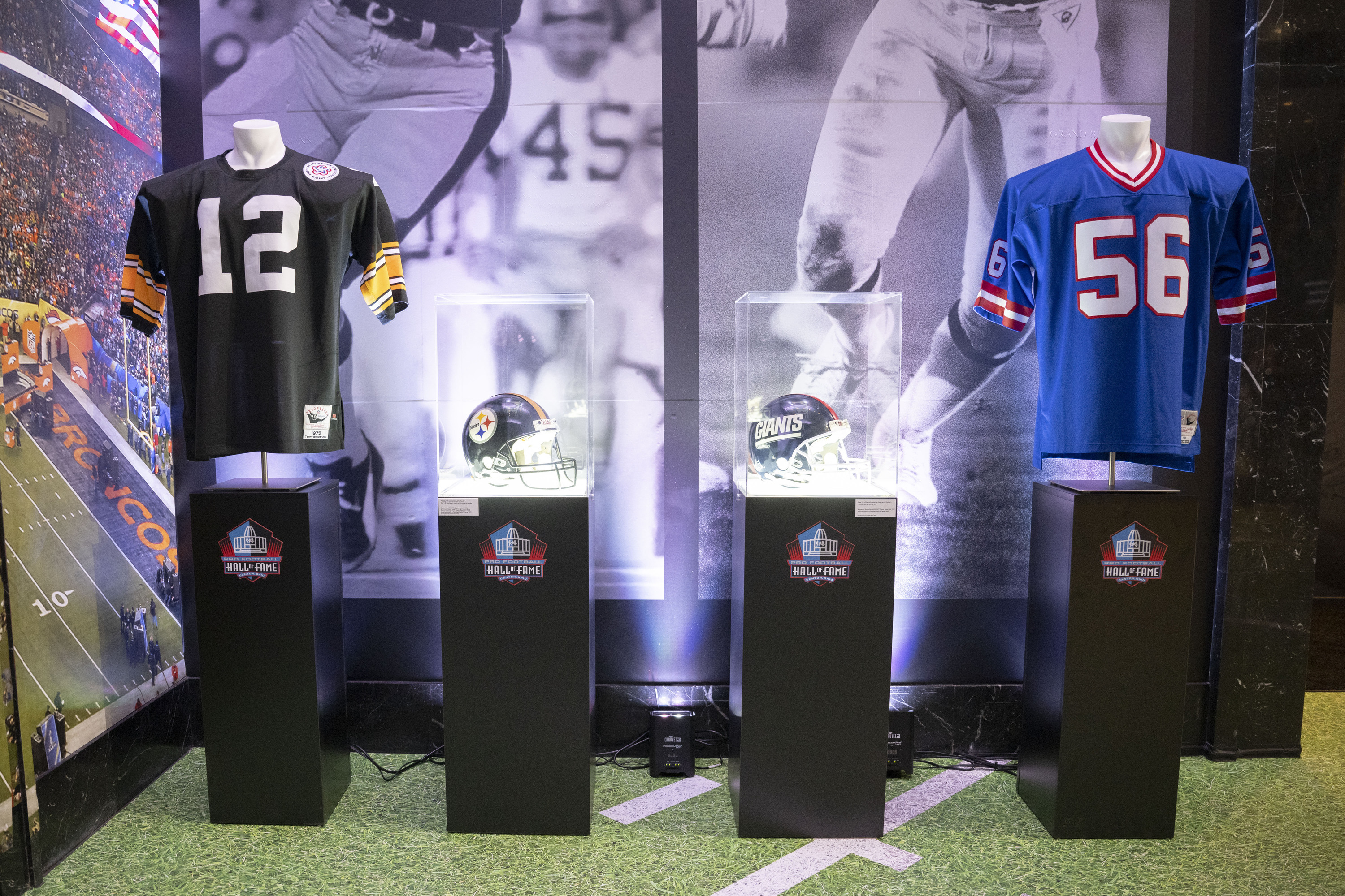 A collection of sports jerseys and helmets.