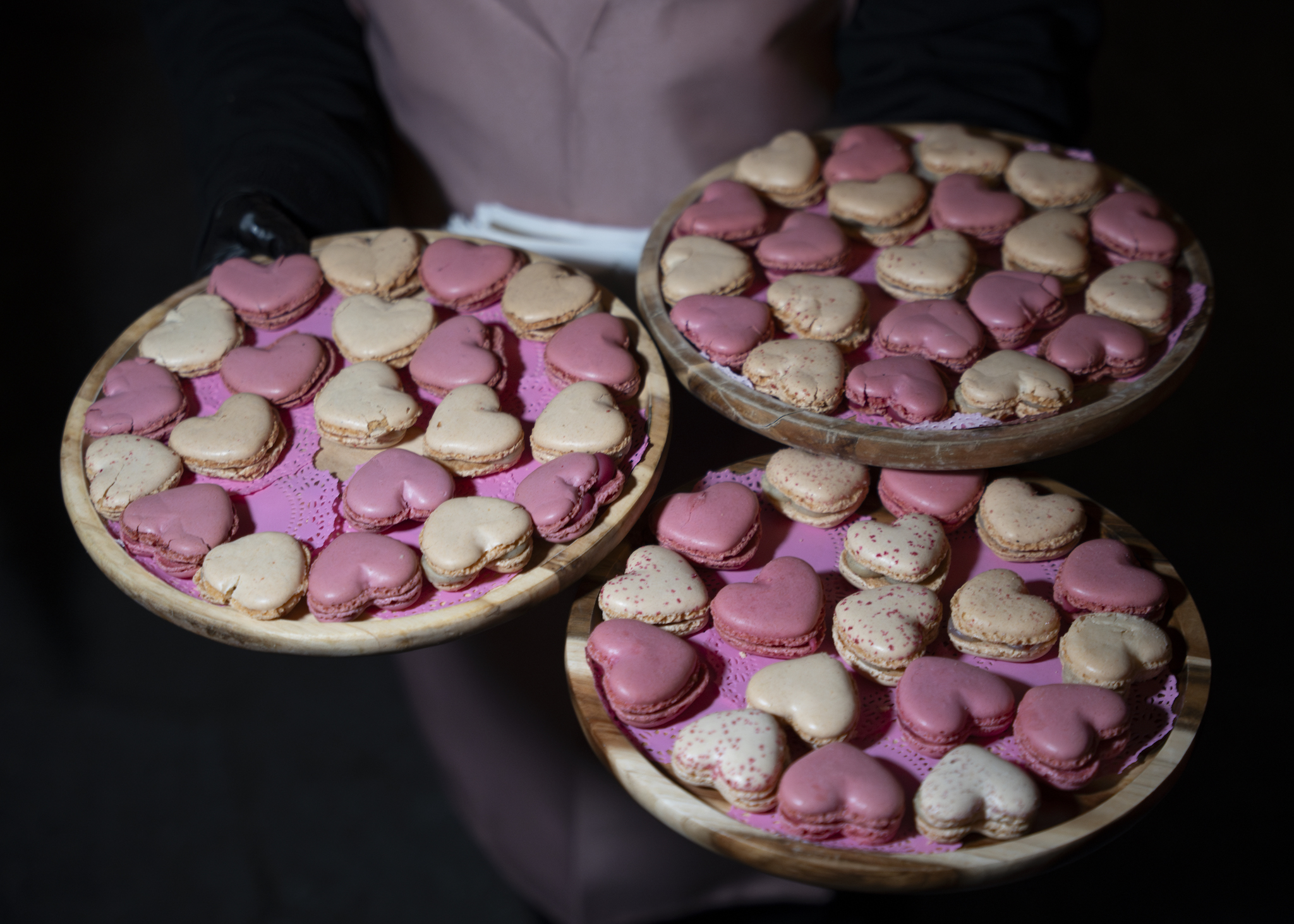 Pink, heart-shaped macarons.