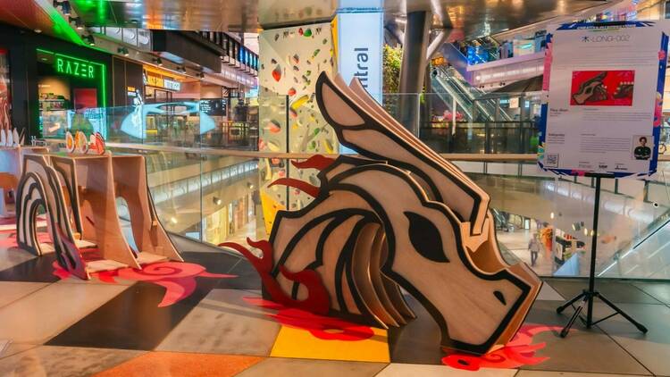 Dragon display and dragon-themed design activity at Ray-Ban