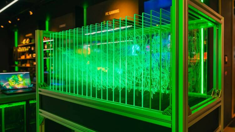 A glowing green AI dragon by Razer™️