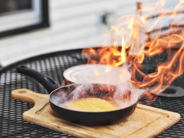 Flaming saganaki at Greek Islands