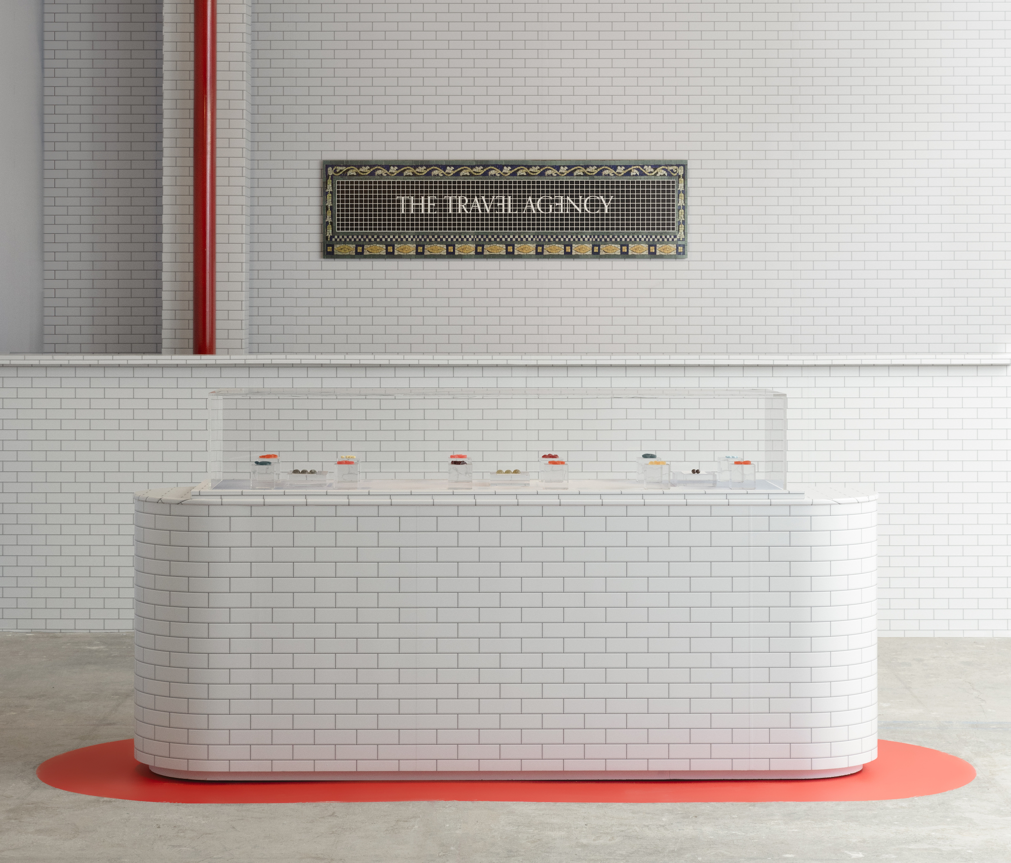 A white brick counter at The Travel Agency.