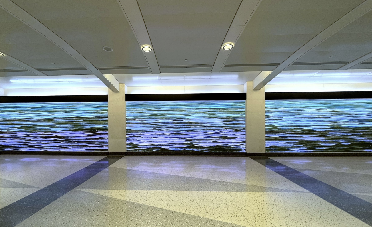 LED screens showcasing digital waves