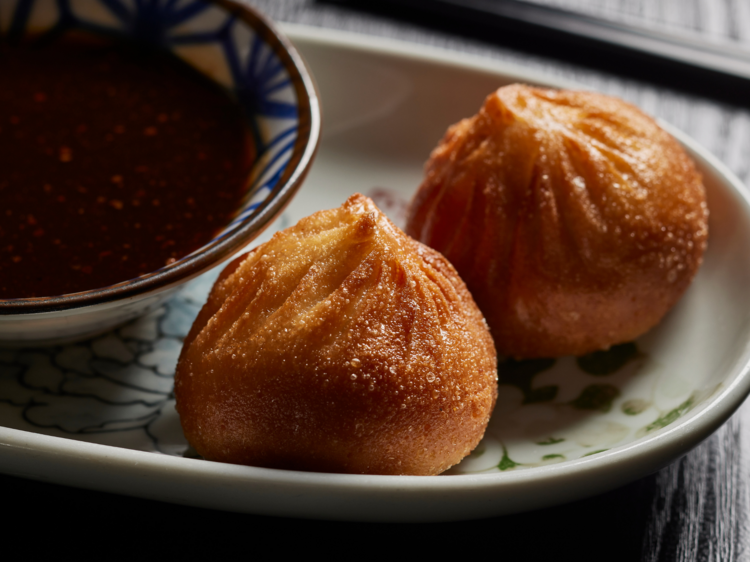 Dig into these lucky golden bao buns at Spice Temple
