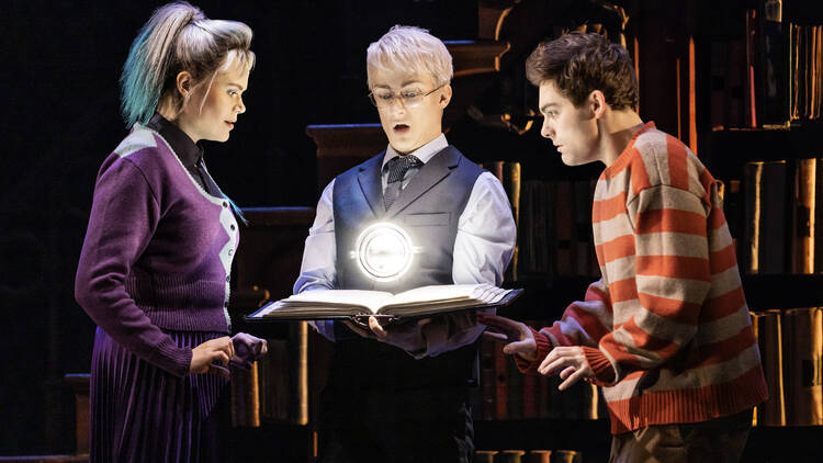 Harry Potter and the Cursed Child on Broadway — students with open book