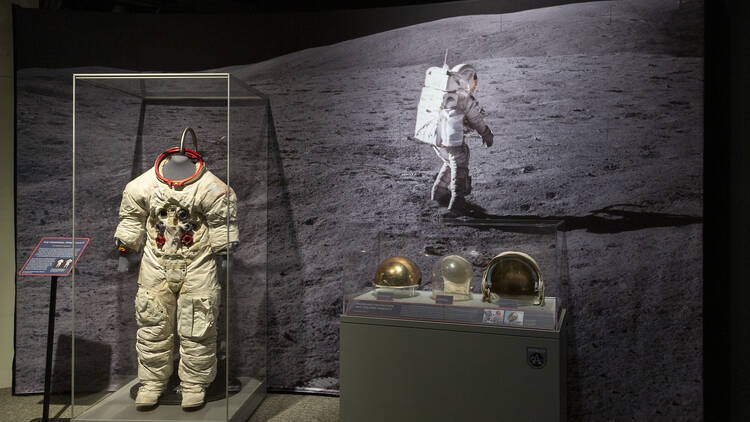 A photo of a spacesuit in the exhibit.