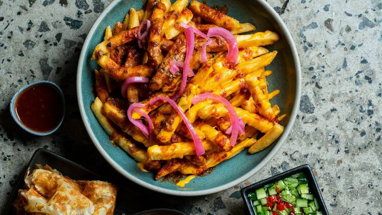 A banquet on a table, including hot chips.