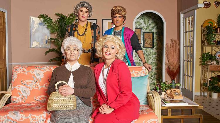 Four actors dressed as the golden girls