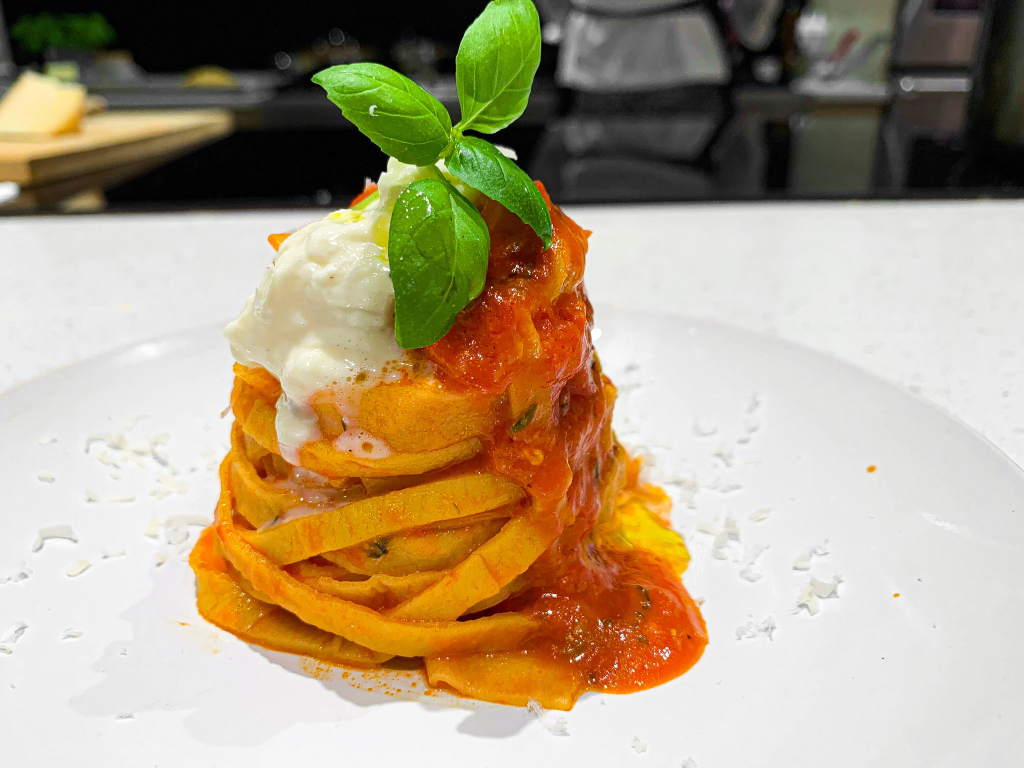 twirled pasta on a plate at Pasta Class Florence at Nimbus Downtown Brooklyn