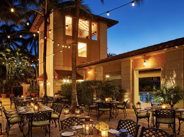 Courtyard lit up with hanging fairy lights at Biltmore Hotel Miami 