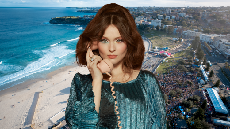 Sophie Ellis-Bextor looks glamorous and holds a pink vintage phone over scenes of Bondi Beach