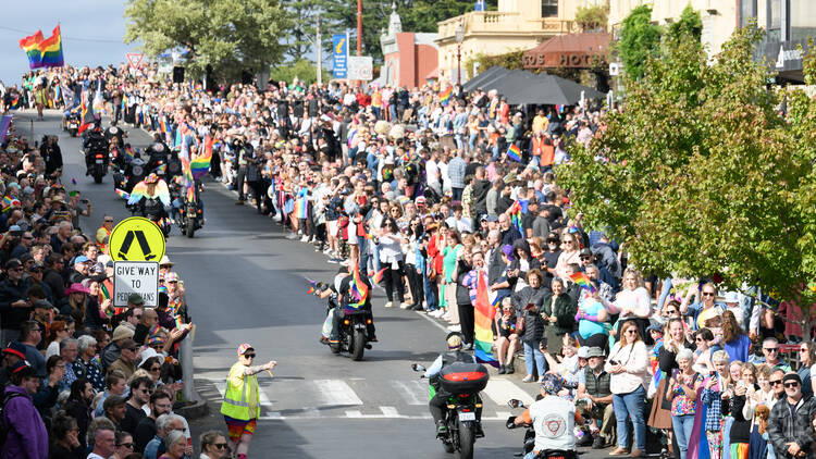 People watching a street parade. 