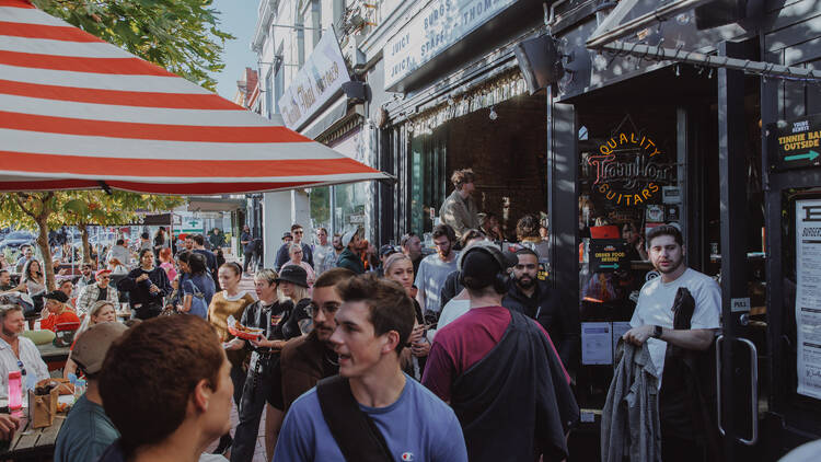 Crowds of spectators gathered around the B.East for a chilli eating competition.