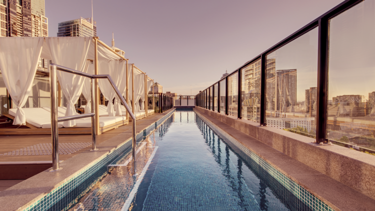 Rooftop pool and cabanas 