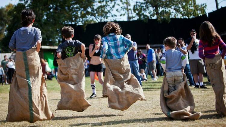  People competing in sack race at Robertson Potato Festival