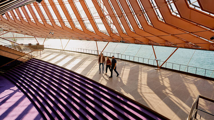 People walking through Sydney Opera House during daytime