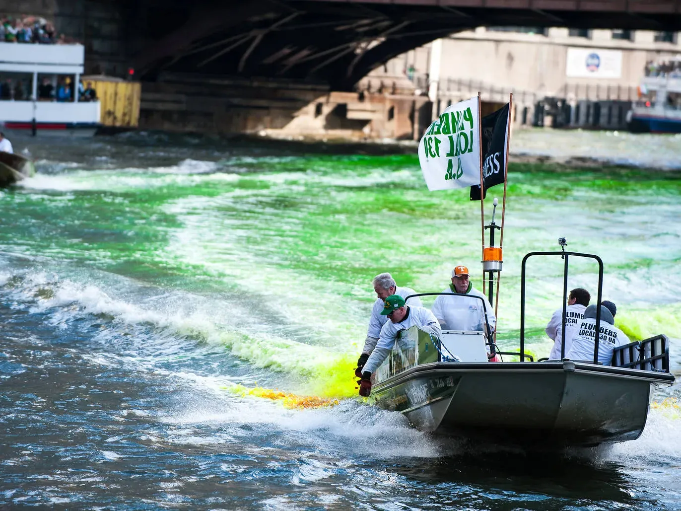 A boat on the chicago river on st patrick's day