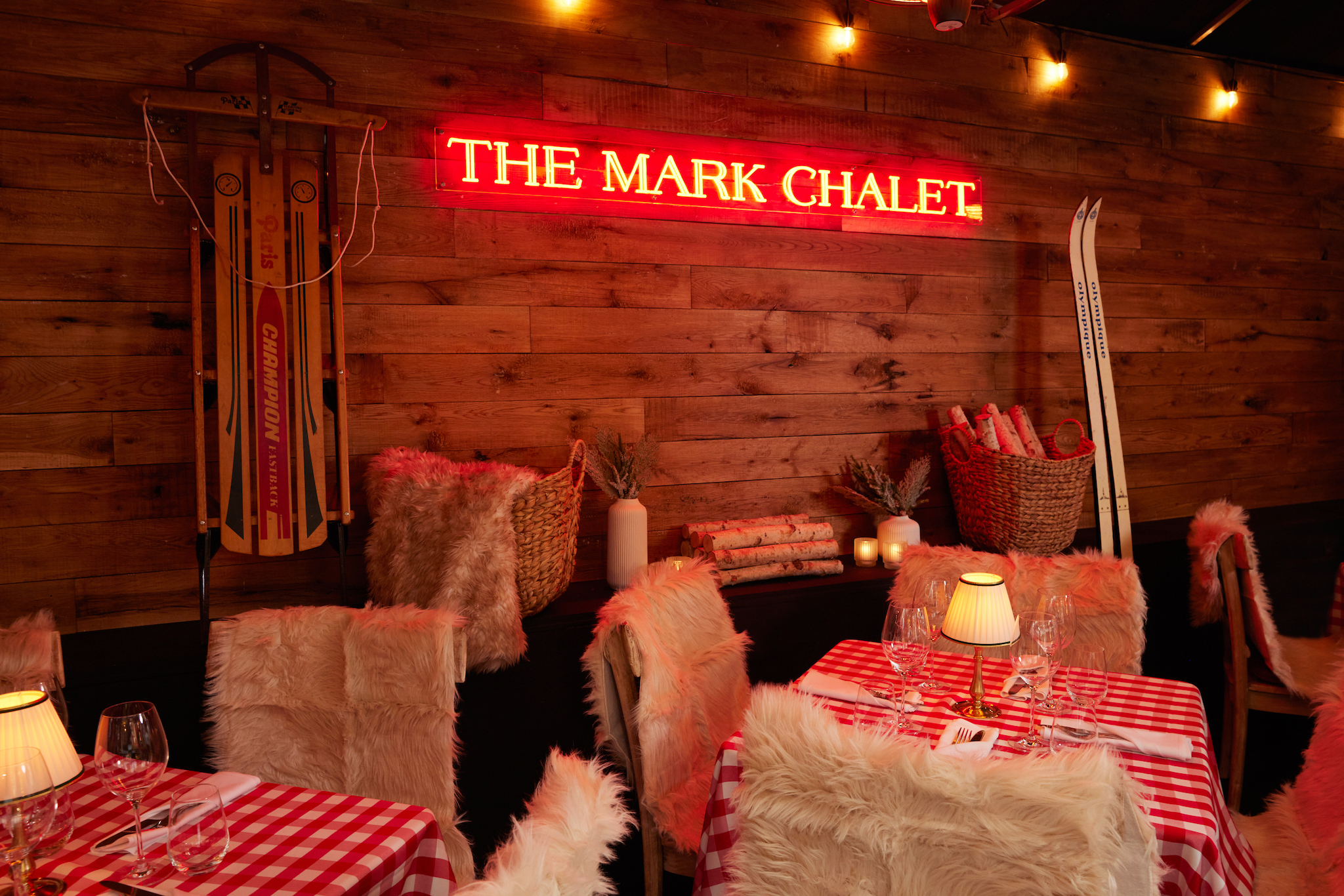 The Mark Chalet by Jean-Georges with gingham tablecloths and cozy accents.