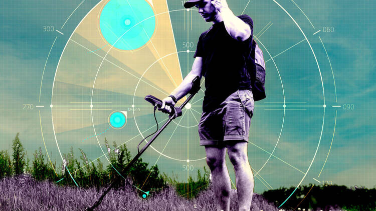 A man metal detecting