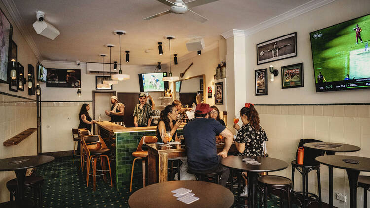 People drinking inside The Magpie