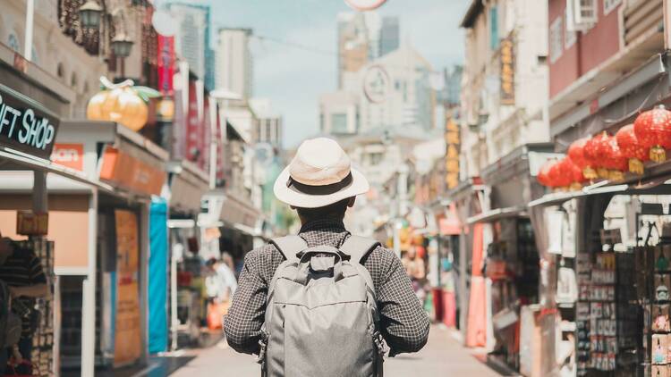 Singapore hidden gems A man in front of an empty street in singapore