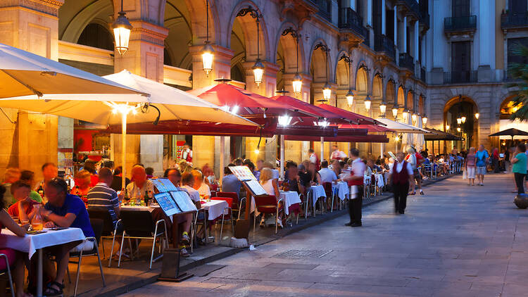 People dining in the nighttime in Spain
