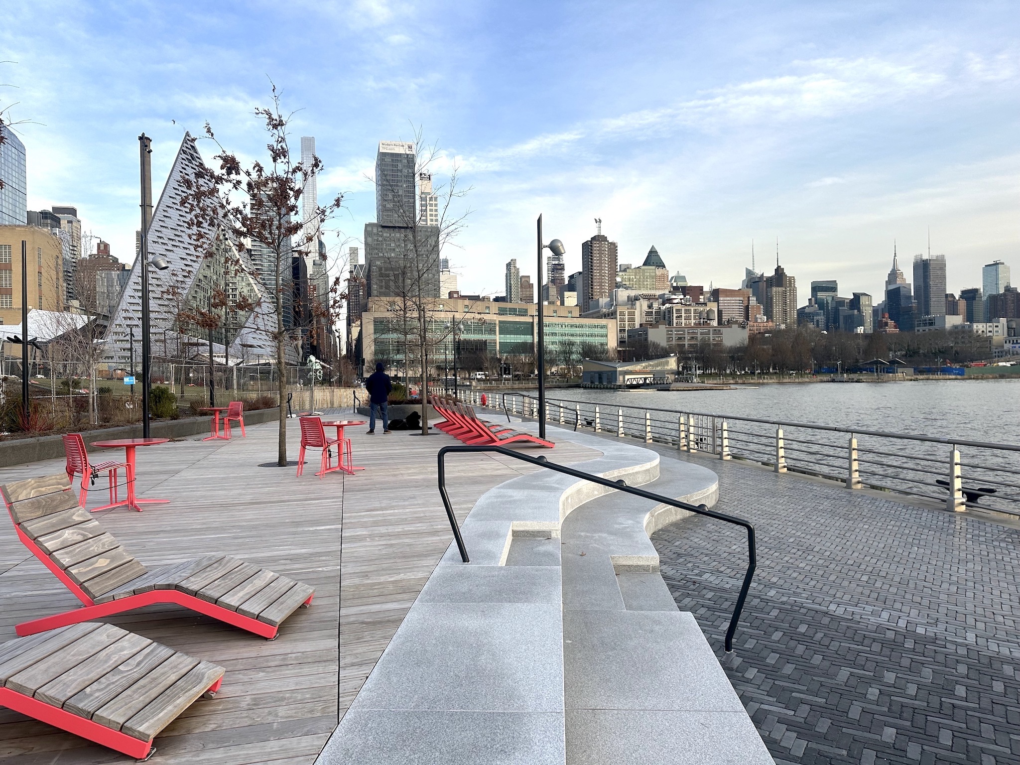 The pier 97 park with red chairs.