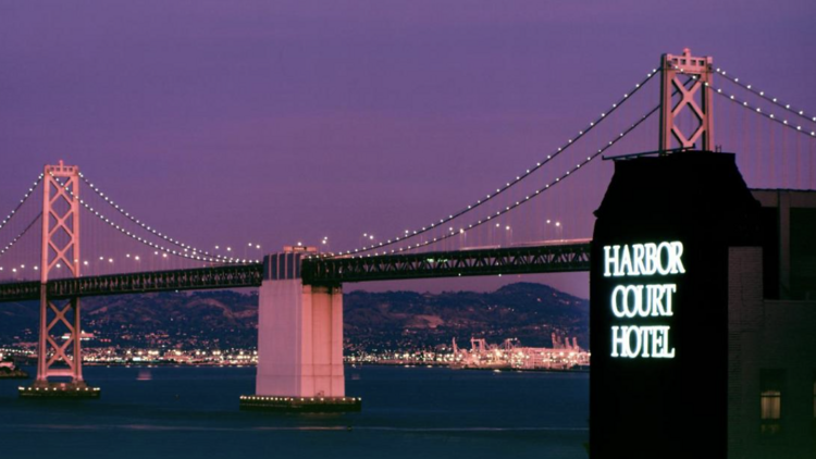 Bay Bridge San Francisco and silhouette of Harbor Court Hotel